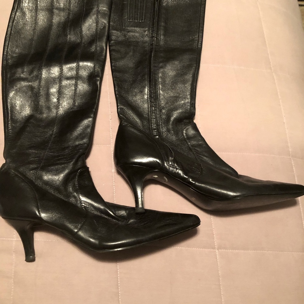 Women classic knee high genuine black leather boots.